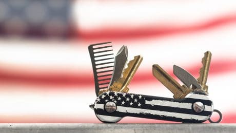 Black Distressed KeyBar in front of American Flag cropped 1920x800